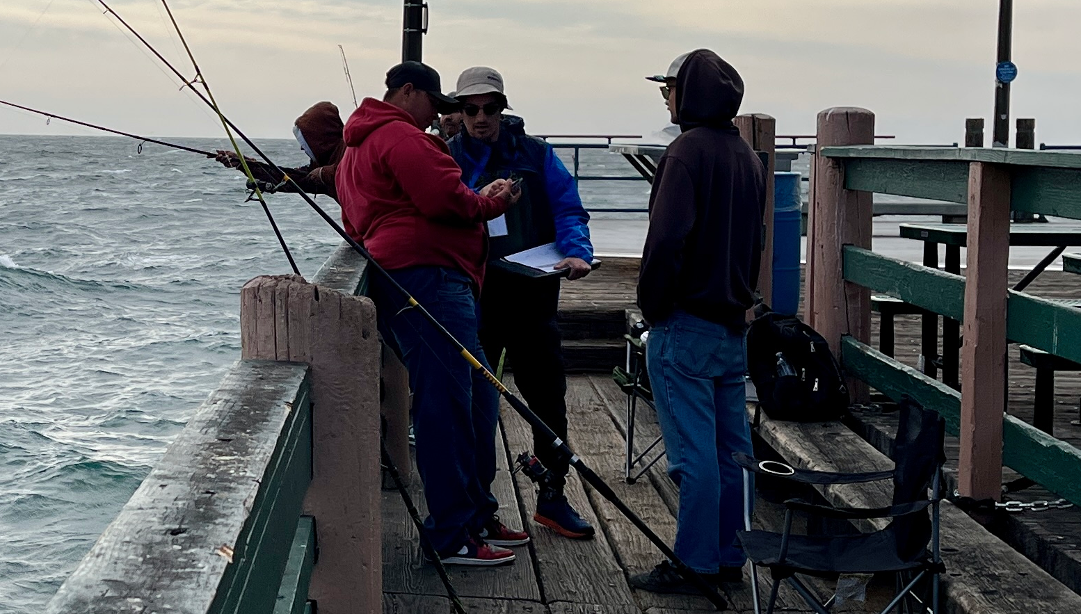 Outreach on a pier to anglers